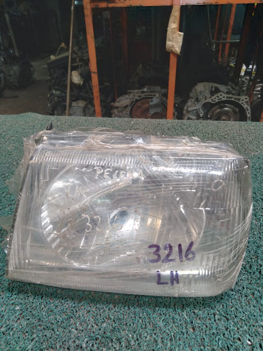 Farol Pajero Mini 1999 LH