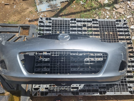 Parachoque Mazda Demio 7279